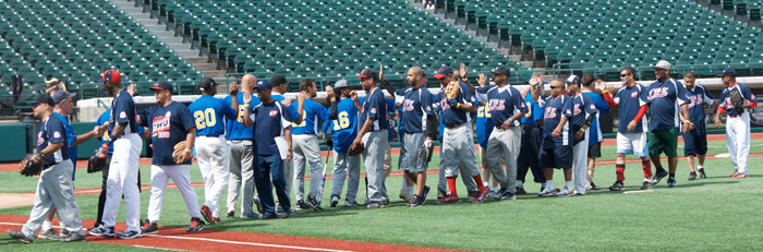 Members took part in a friendly baseball game. Shaking hands afterwards