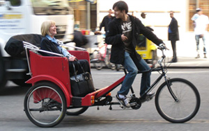 New York City pedicab driver takes a woman to Central Park