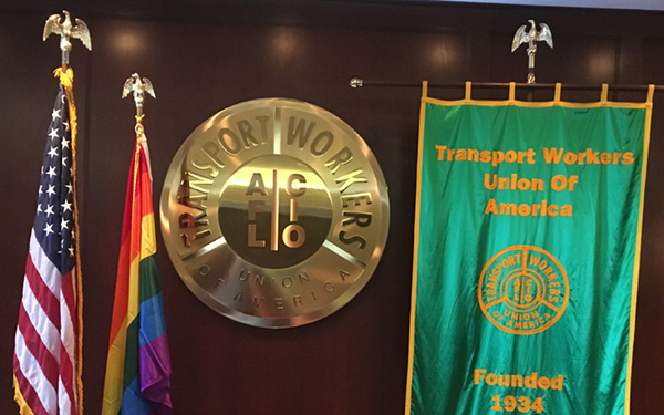 TWU seal, American Flag and Pride/Rainbow flag